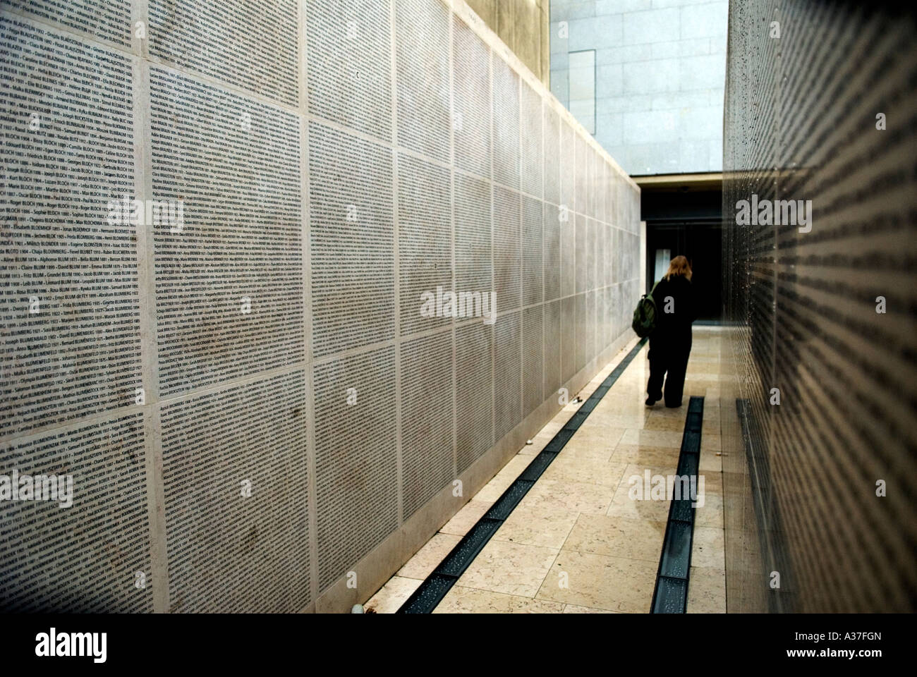 PARIS FRANCE SHOAH MEMORIAL MUSEUM THE WALL OF NAMES OF THE 76 000 JEWS DEPORTED IN WW2 Stock Photo