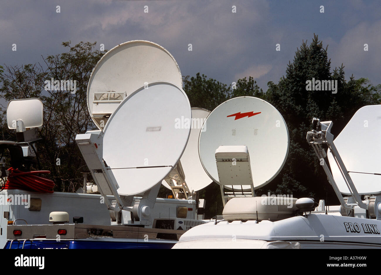 Portable microwave satellite dishes on news truck Stock Photo