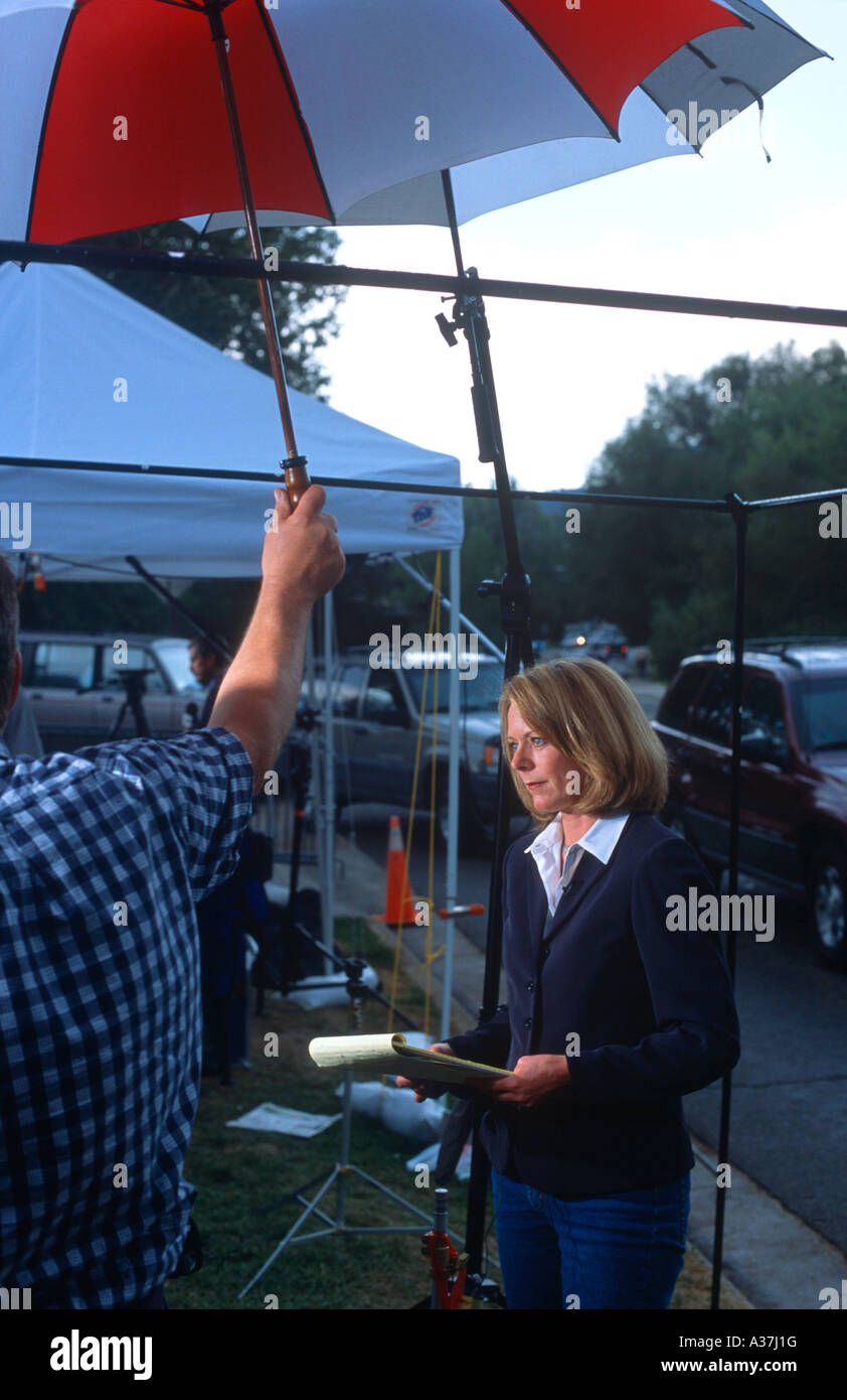Leanne Gregg NBC News Channelbroadcasts story on rainy day in Boulder Colorado Stock Photo
