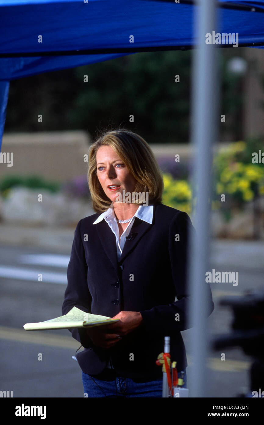 Leanne Gregg NBC News Channelbroadcasts story on rainy day in Boulder Colorado Stock Photo