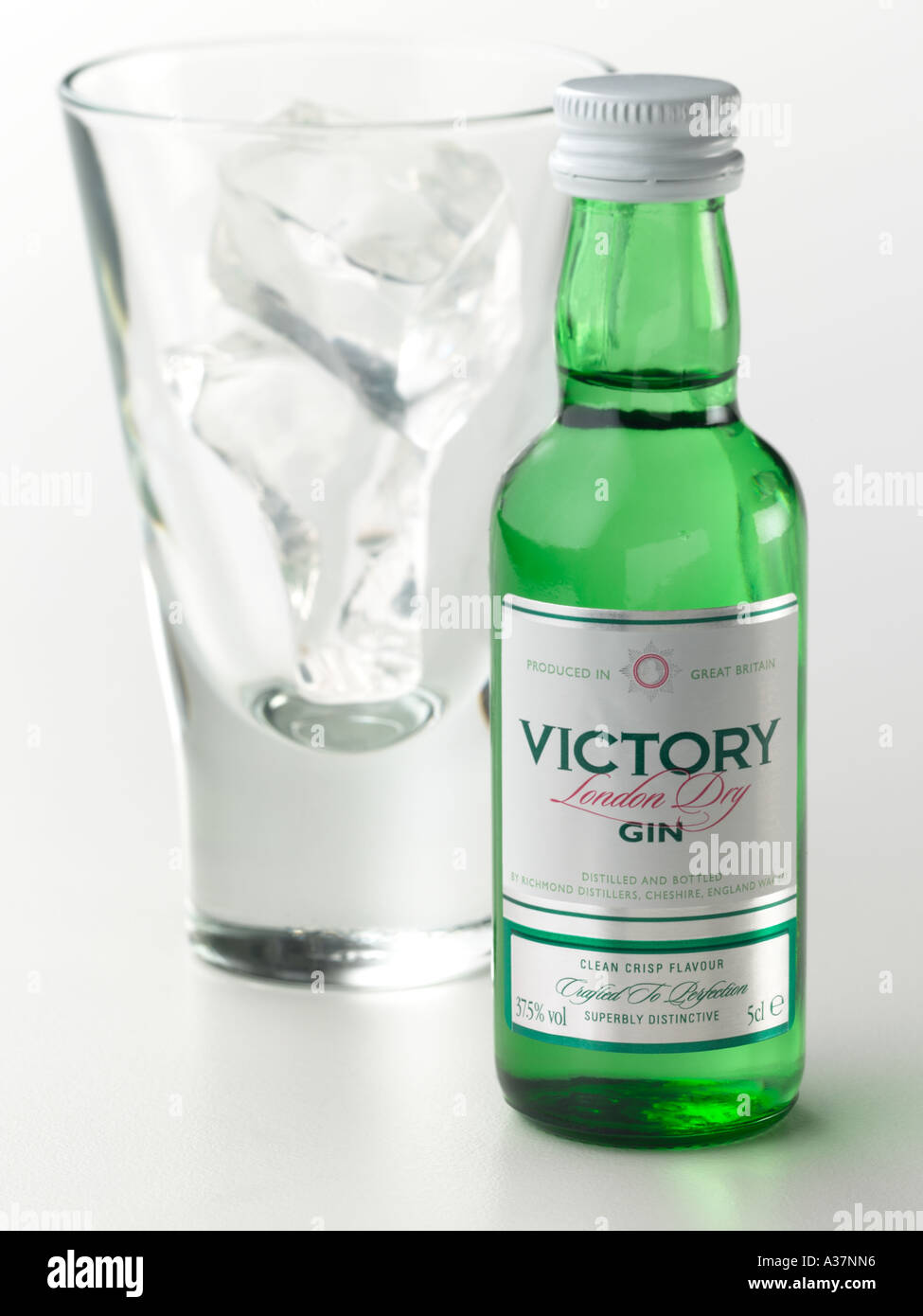 Download Miniature Gin Bottle And Glass With Ice Stock Photo Alamy Yellowimages Mockups