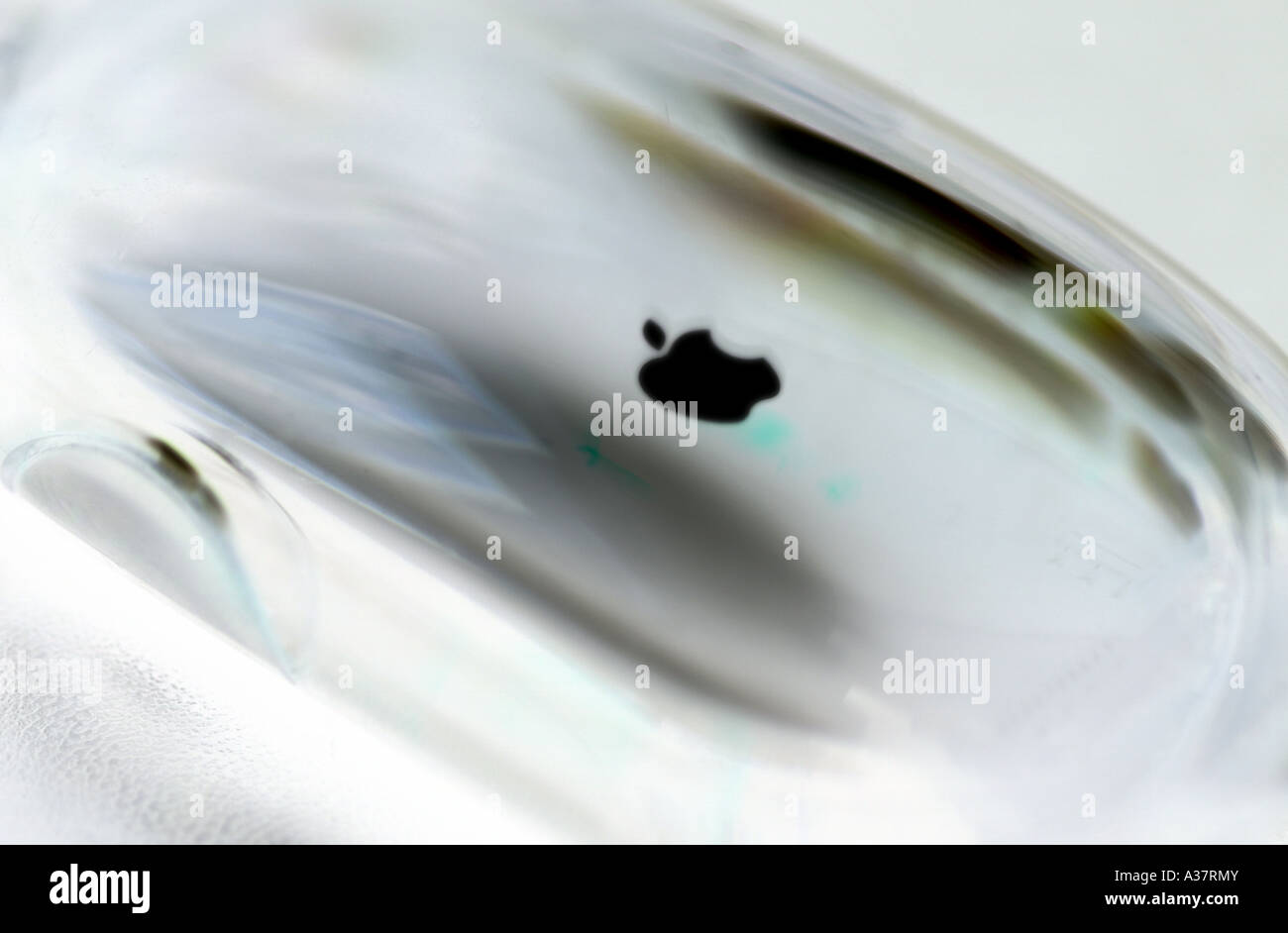 Inverse of transparent iMac computer mouse UK Stock Photo - Alamy