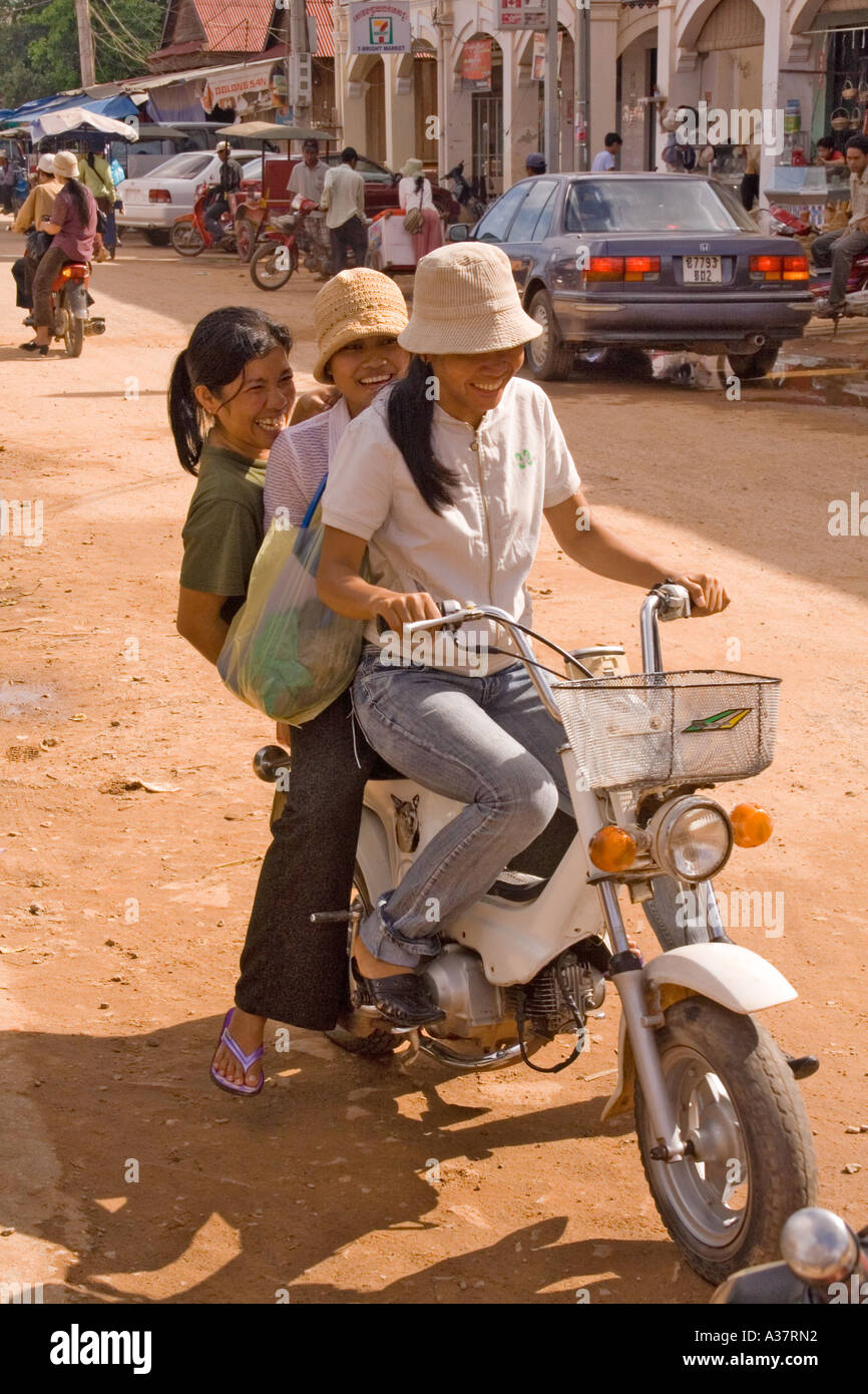 3 girls on motorbike girls, three, 3, motorbike, mofa Stock Photo