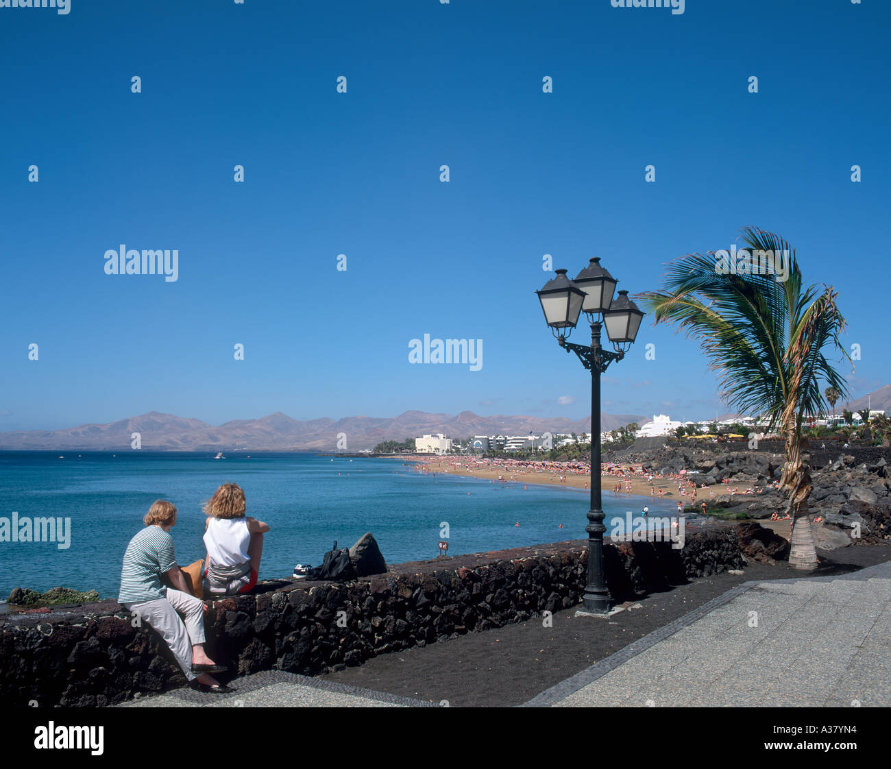 Promenade and Beach, Puerto del Carmen, Lanzarote, Canary Islands, Spain Stock Photo