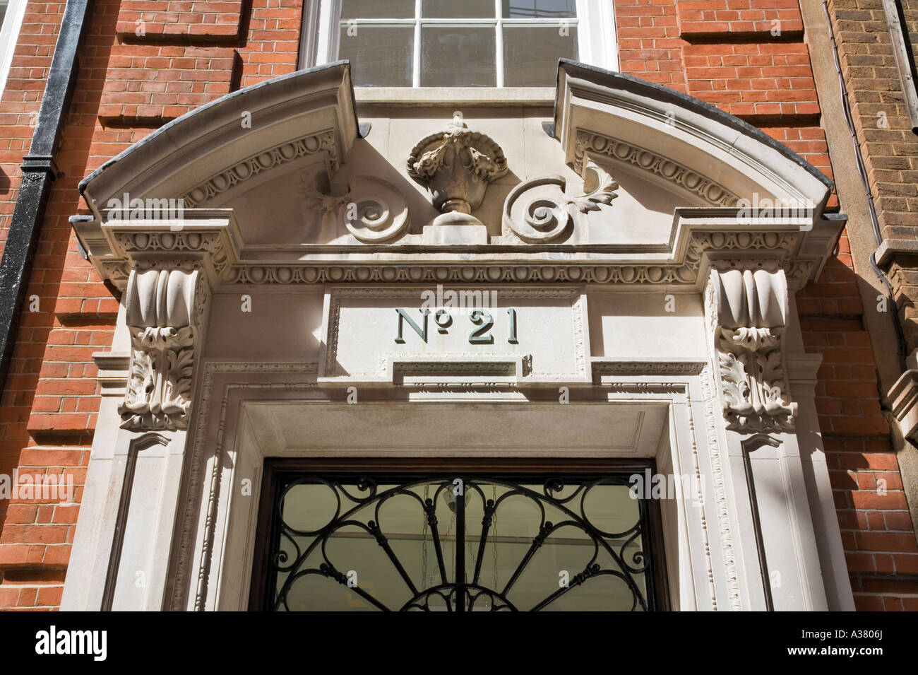Ornate Georgian entrance door to refurbished offices in Ironmonger Lane, City of London Stock Photo