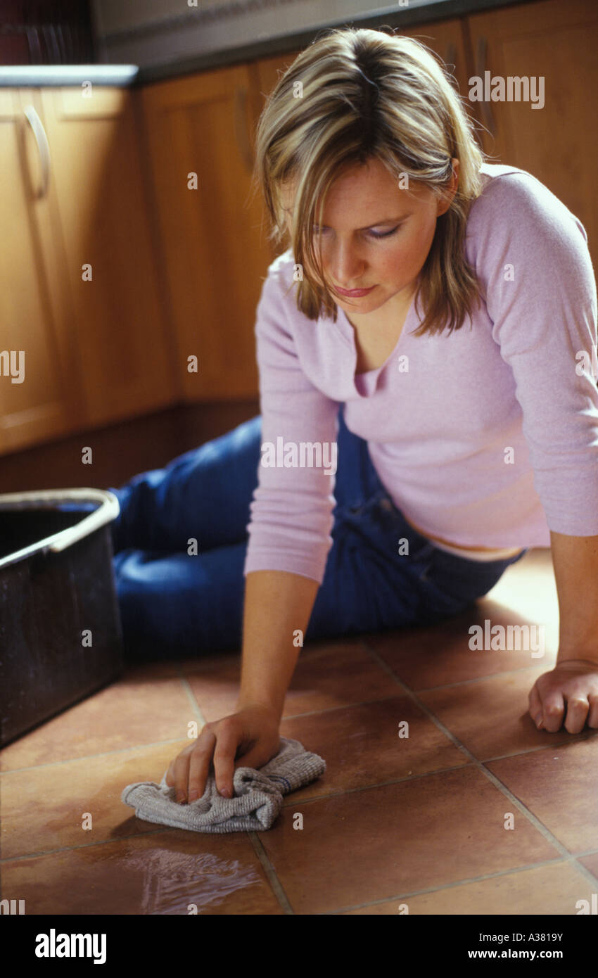 woman scrubbing the floor Stock Photo Alamy