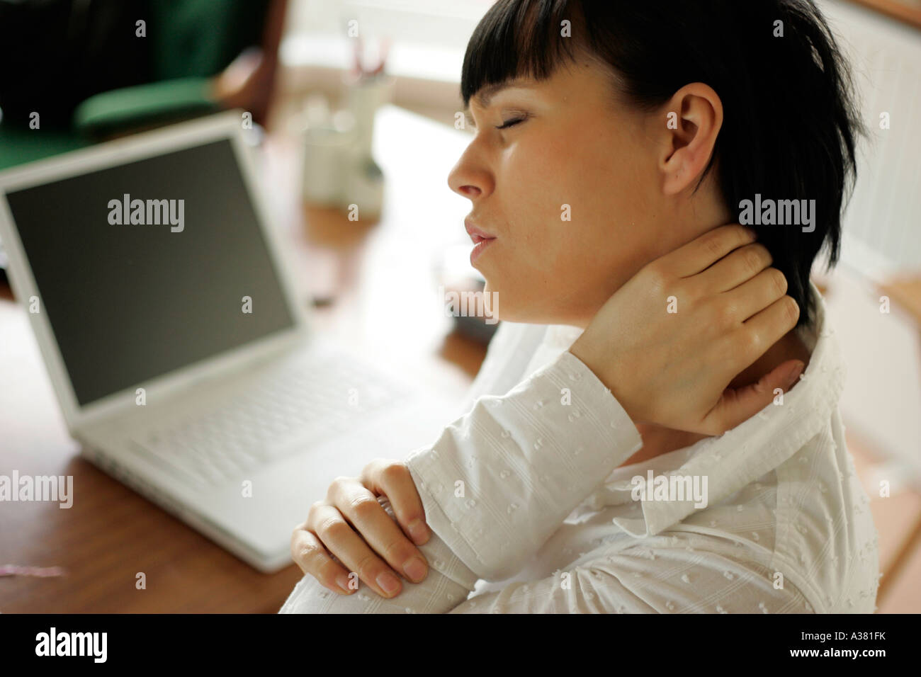 Shoulder Pain And Computer High Resolution Stock Photography and Images