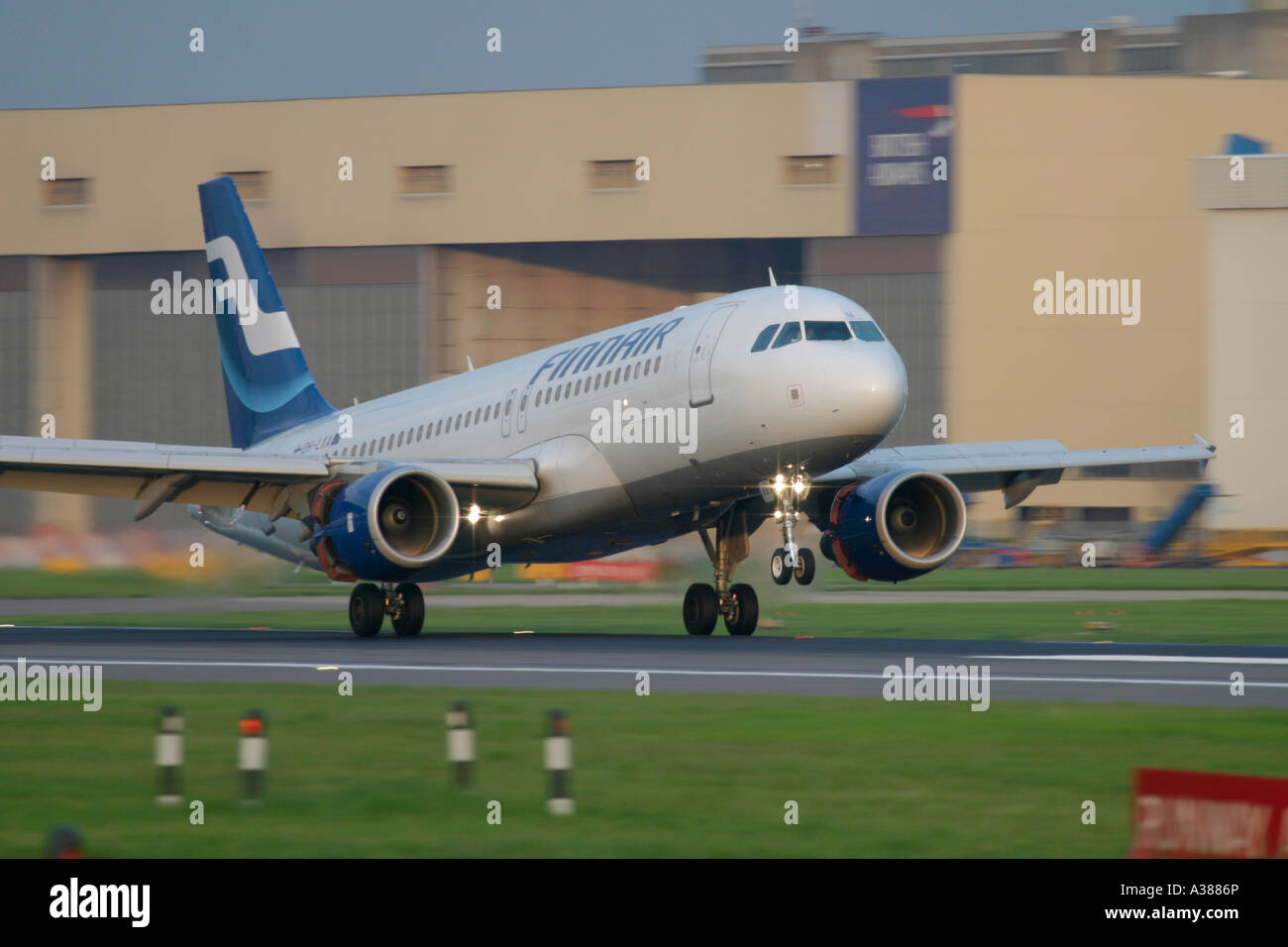 Finnair Airbus A320 landing at London Heathrow Airport Stock Photo Alamy