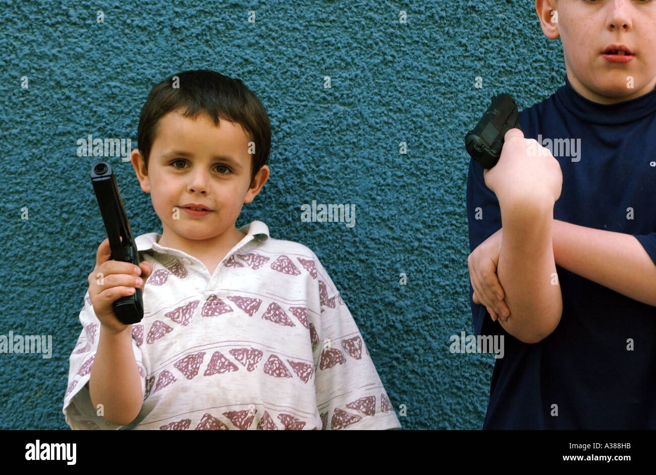 Two young polish boys with plastic guns Stock Photo Alamy