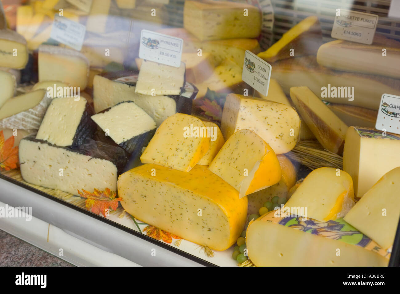 Cheese on sale in French Market in New Road Gravesend Kent Stock Photo Alamy
