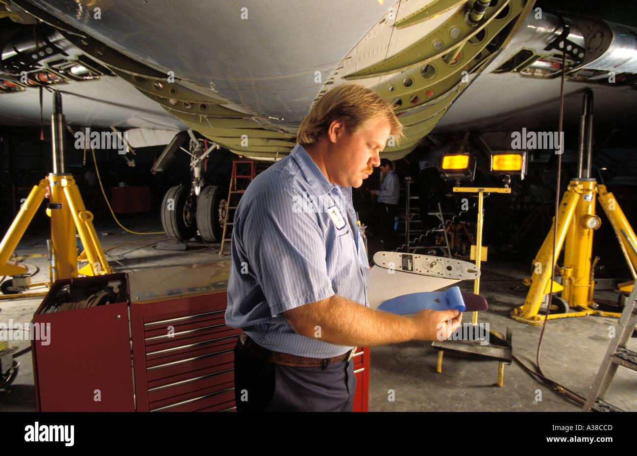 Aircraft Technician Performing Maintenance On Boeing 737 Aircraft Stock ...