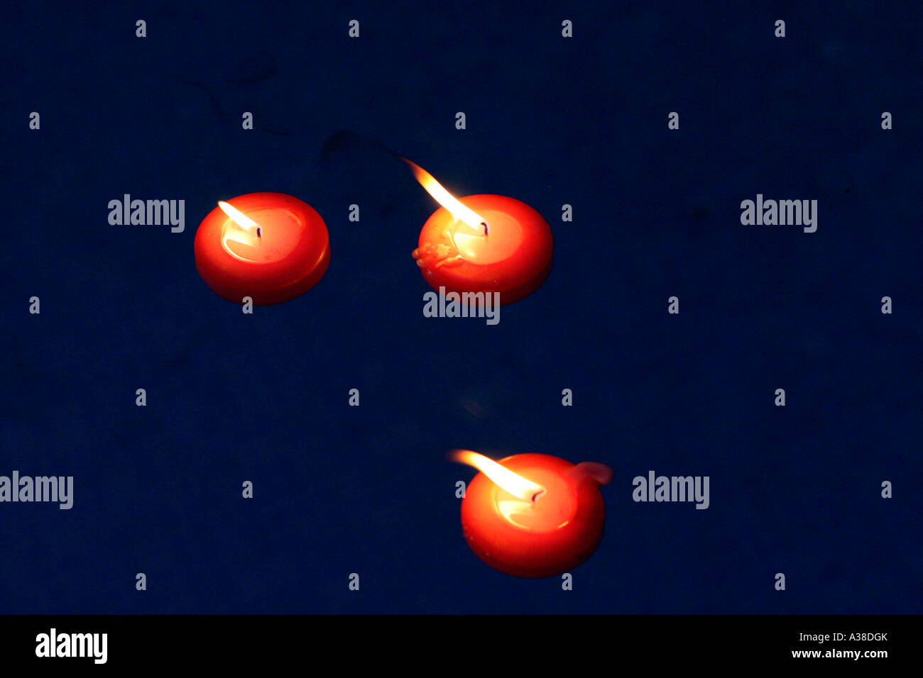 Floating candles on water Stock Photo Alamy