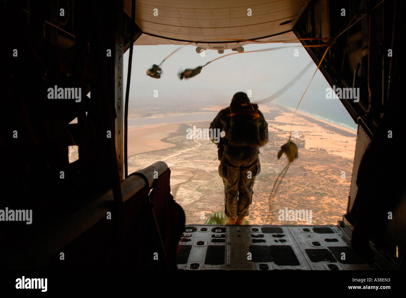 Senegal Army soldiers and U S Army Special Operations Command Europe soldiers perform a static line parachute jump. Stock Photo