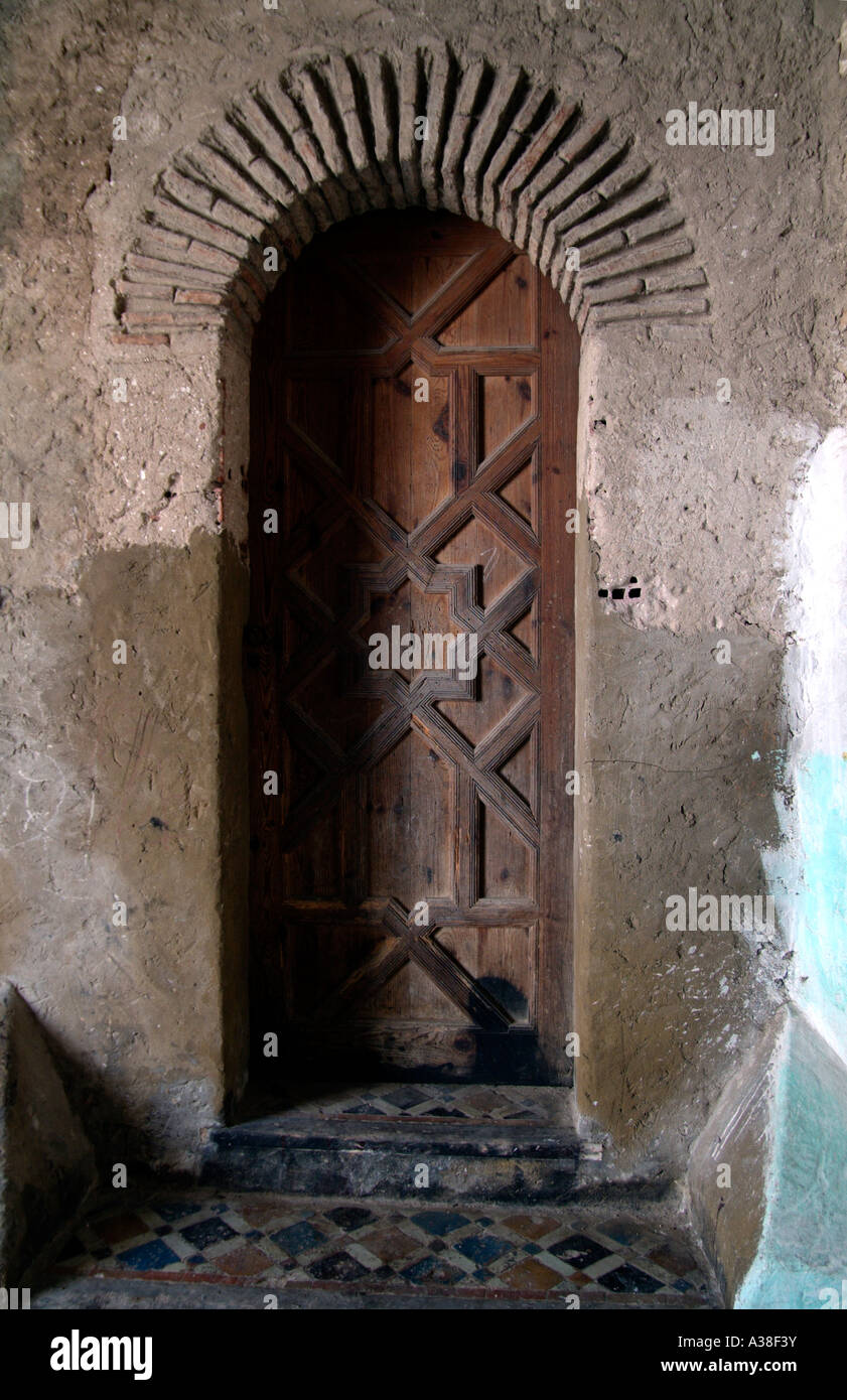 Wooden Door with a six-pointed star pattern in an alley way in the Medina in Tangiers. Stock Photo