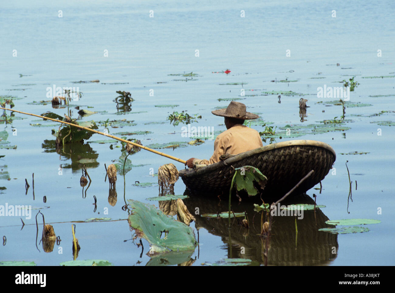 man fishing on lake hanoi vietnam Stock Photo