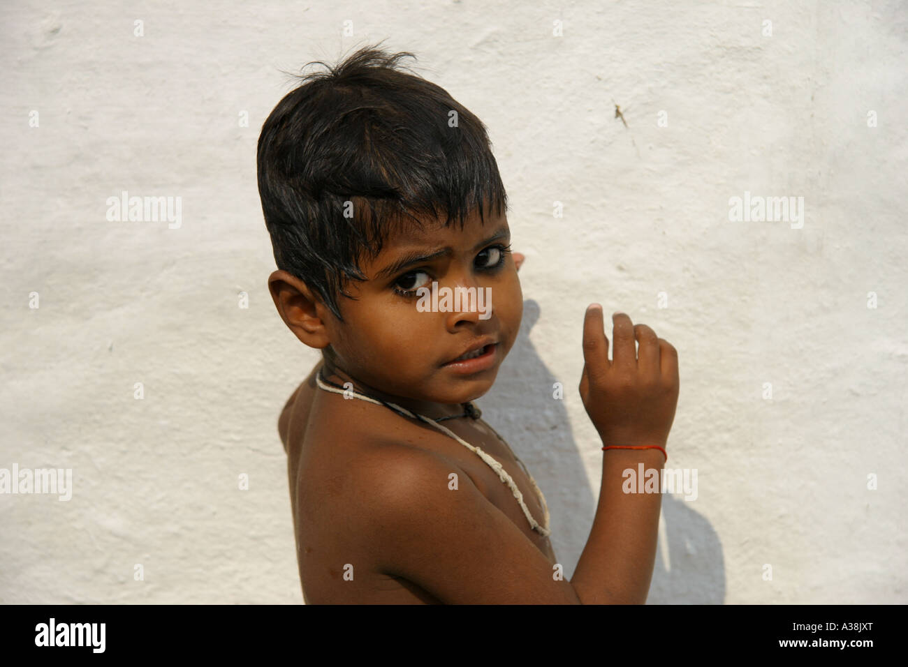 Boy after a wash, clean and ready for Diwali in Khajuraho, Madhya Pradesh, India Stock Photo