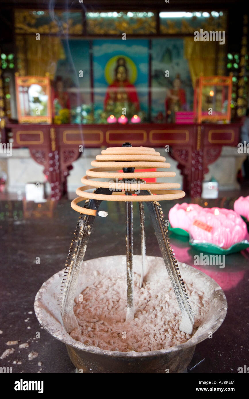 Burning incense at the Snake Temple Penang Stock Photo