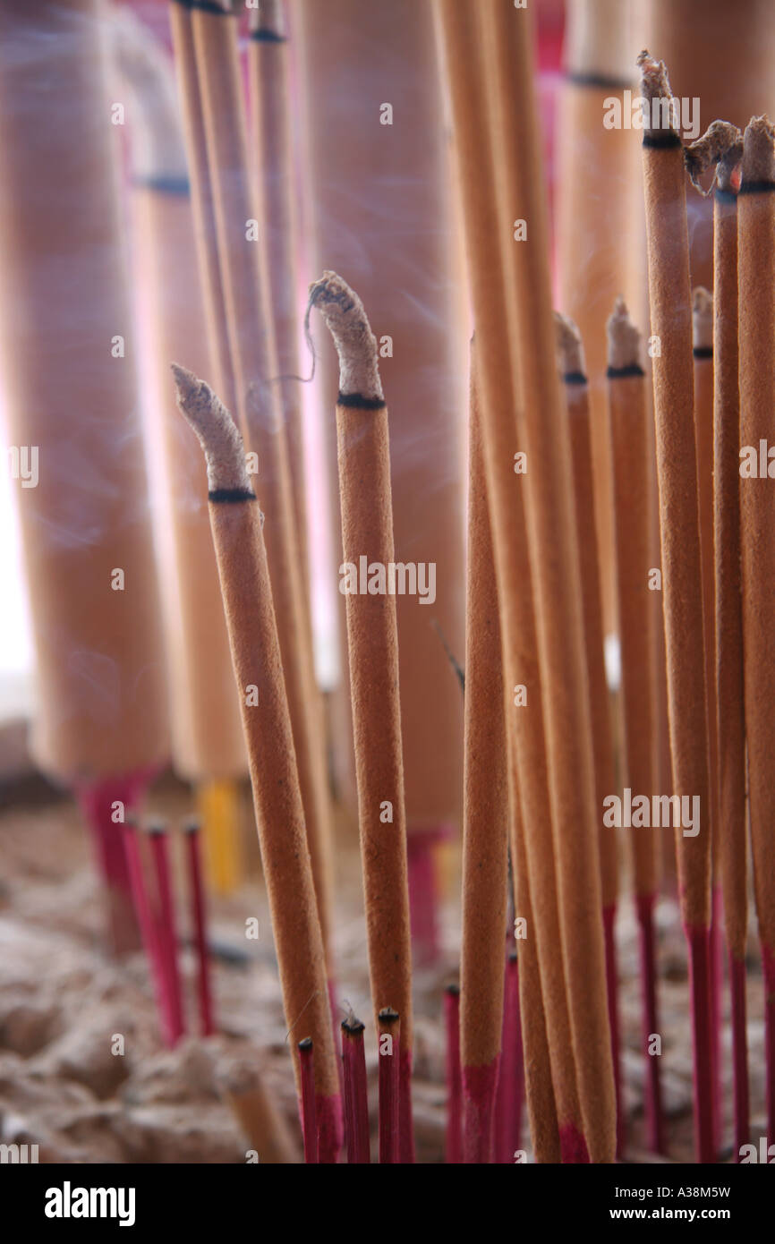 Burning incense sticks in the Thian Hock Keng Temple in Chinatown