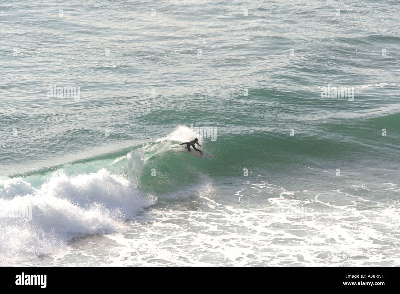Surfer at Praia de Beliche beach Sagres most southwesterly point Europe Algarve Portugal Stock Photo