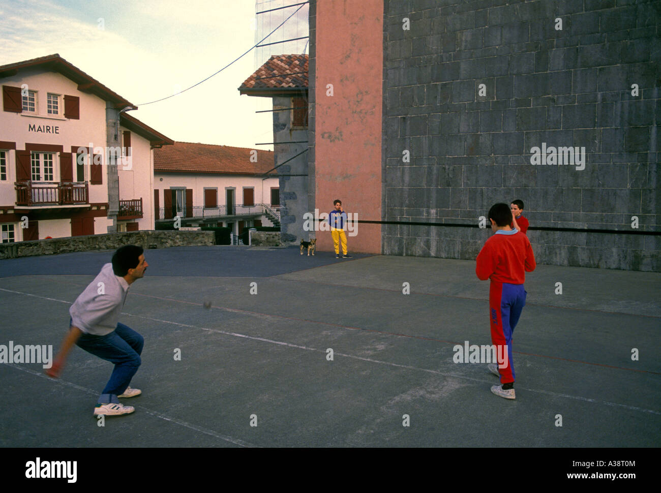 French Basque people man and boys playing handball pelota pilota in the French Basque Country in