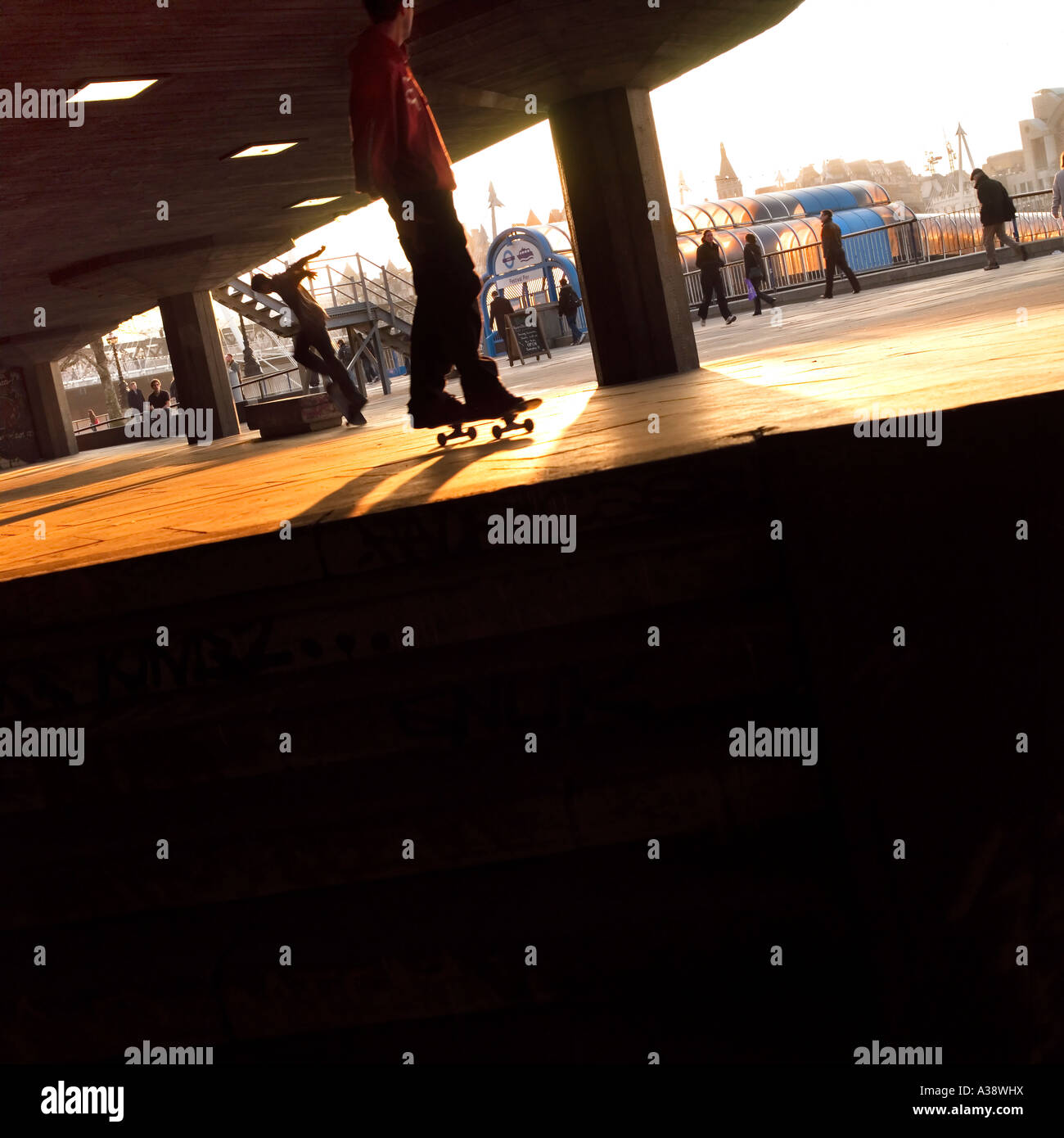 Skateboarder South Bank No model release required: crop, distance, silhouette shadow means no one in shot recognizable Stock Photo