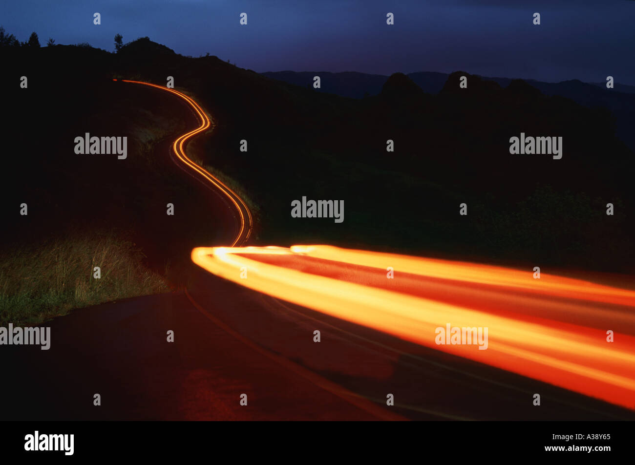 Time delay of headlights on country road Stock Photo Alamy
