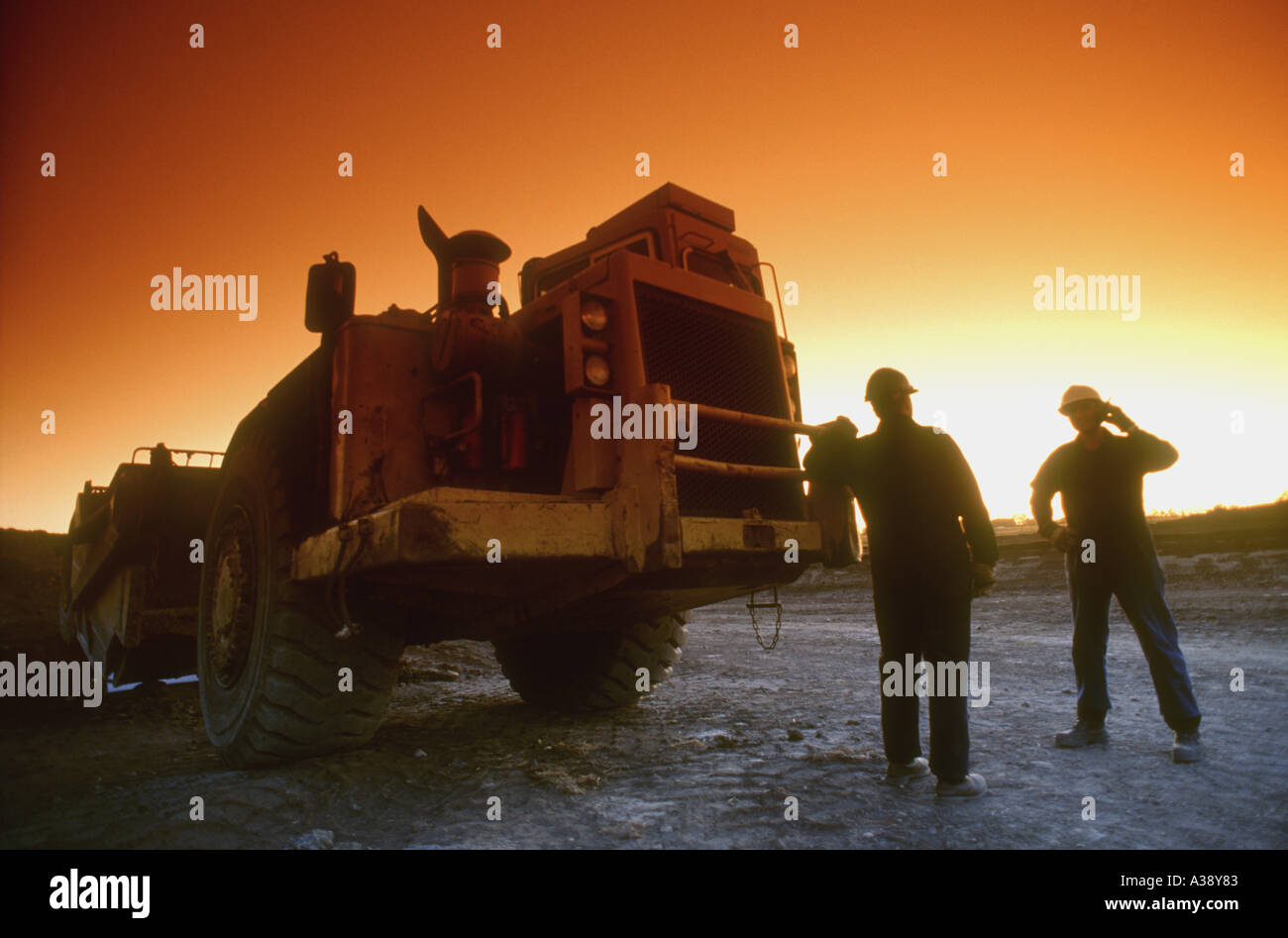 Construction workers and tractor Stock Photo Alamy