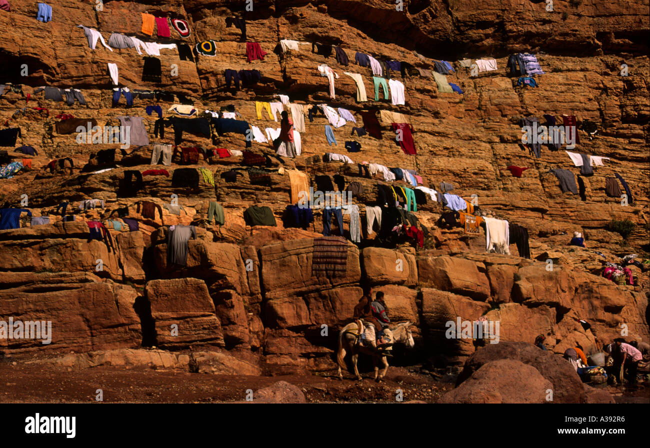 Wash clothes on rock hi-res stock photography and images - Alamy