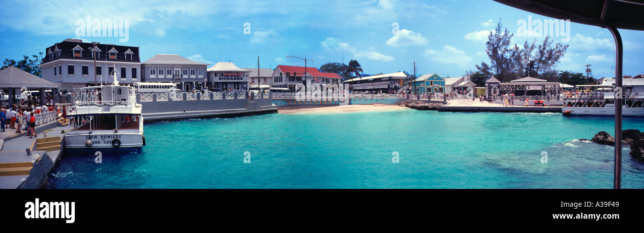 George Town Grand Cayman Island Aqua Water Ocean Clear Town People Shopping Boat Docked upscale yacht yachts panorama panoramic Stock Photo