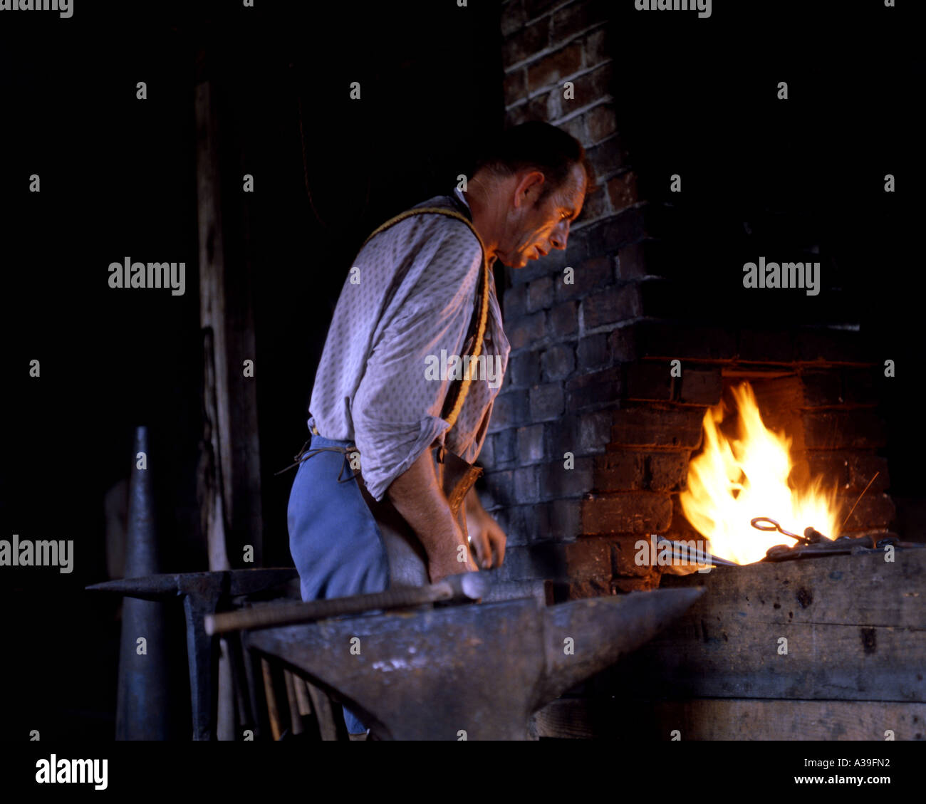 CA NEW BRUNSWICK Blacksmith at Kings Landing Settlement Stock Photo