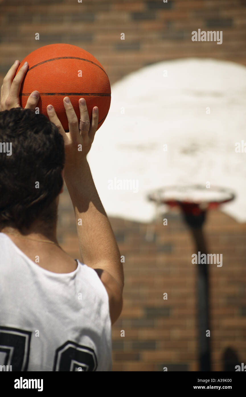 Basketball player taking aim Stock Photo Alamy