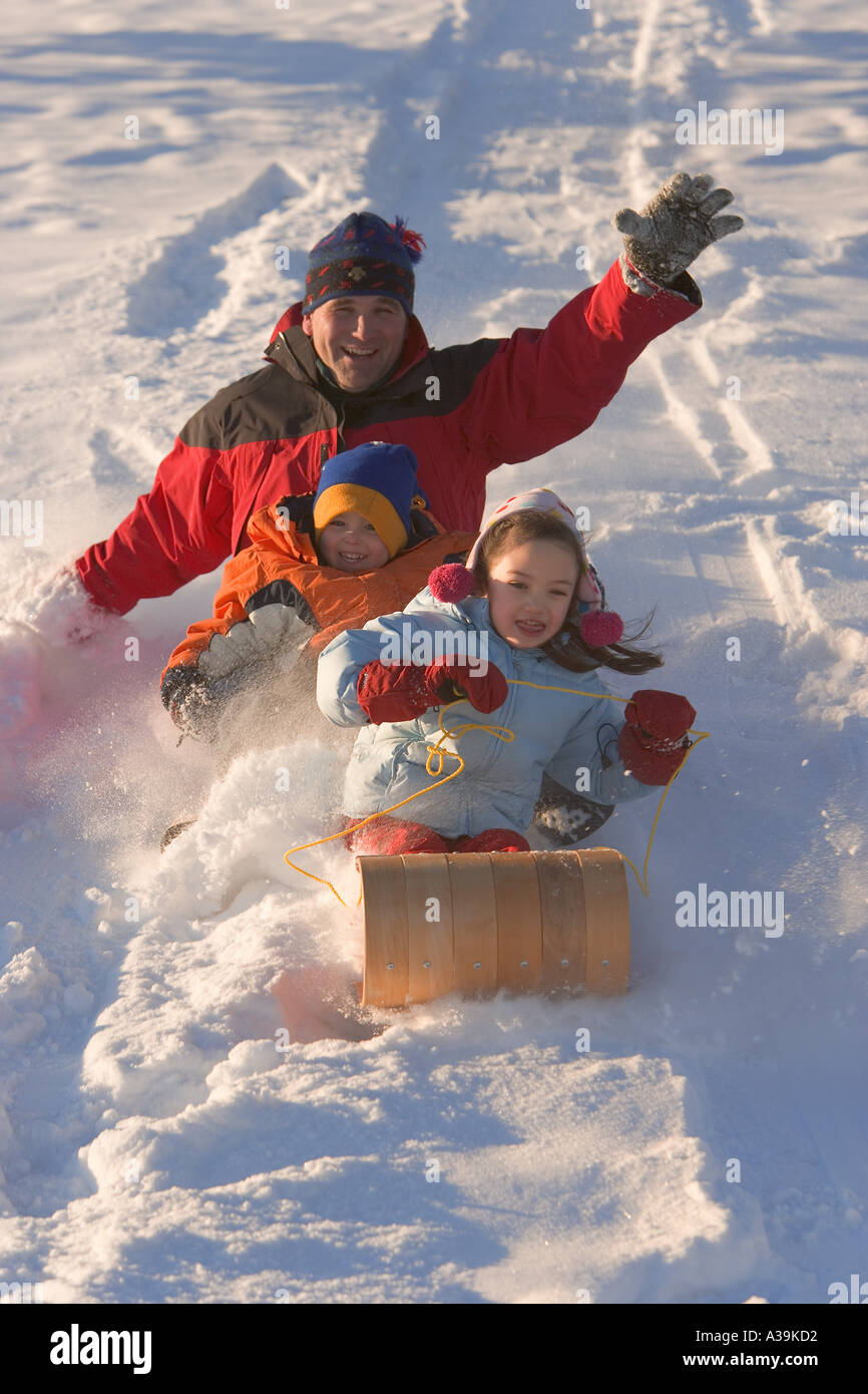 Father daughter playing toboggan hires stock photography and images