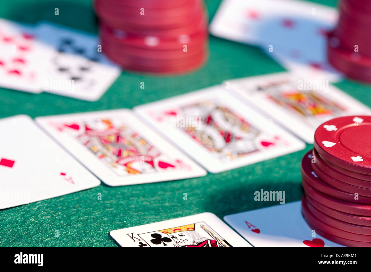 Game of poker cards on table with large poker chips Stock Photo