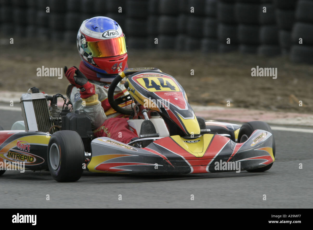 Mini Max Class Kart Driver Shows The Slowing Up Sign At The End Of A 