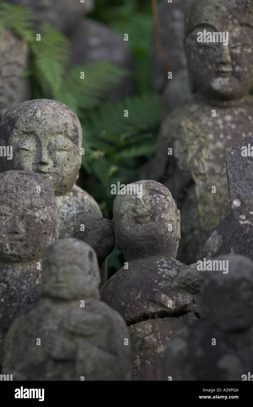 Smiliing statue in a cemetery, Aomori, japan Stock Photo