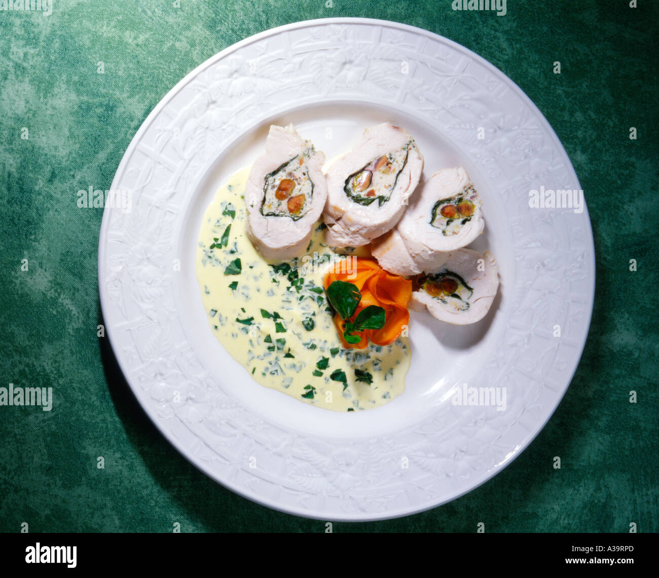 A delicious chicken terrine starter on a plain white plate, dieting