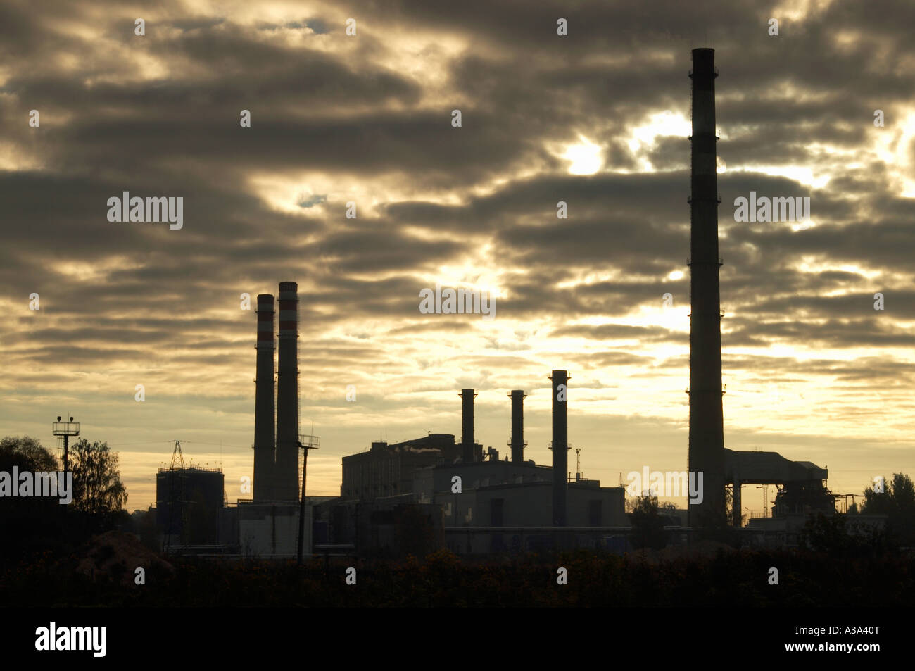 Power plant under dramatic sky Stock Photo - Alamy
