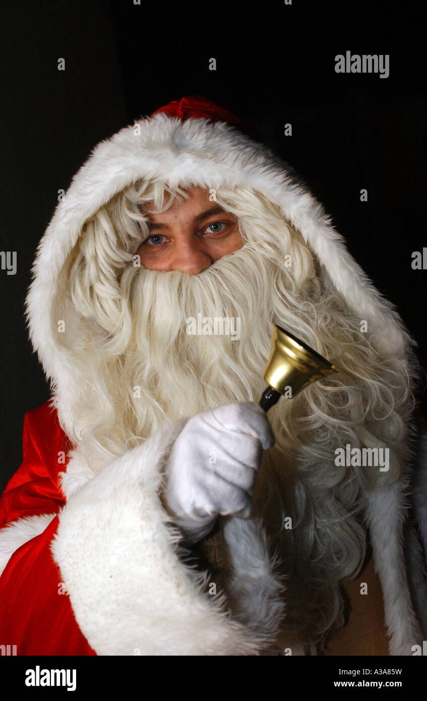 Santa Claus with a little bell Stock Photo