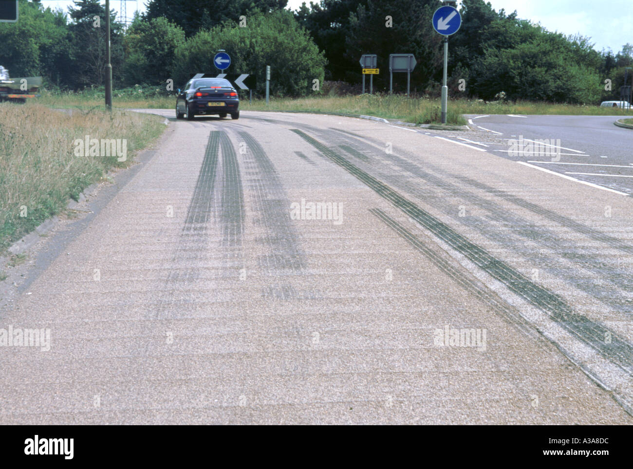 Tyre skidmarks on road surface Stock Photo