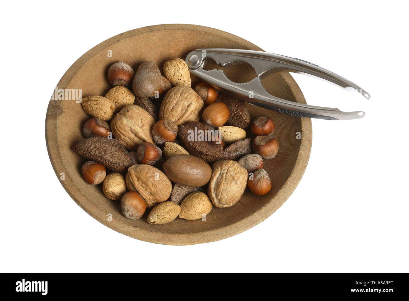 Nuts in Wooden Bowl with Nutcracker Stock Photo