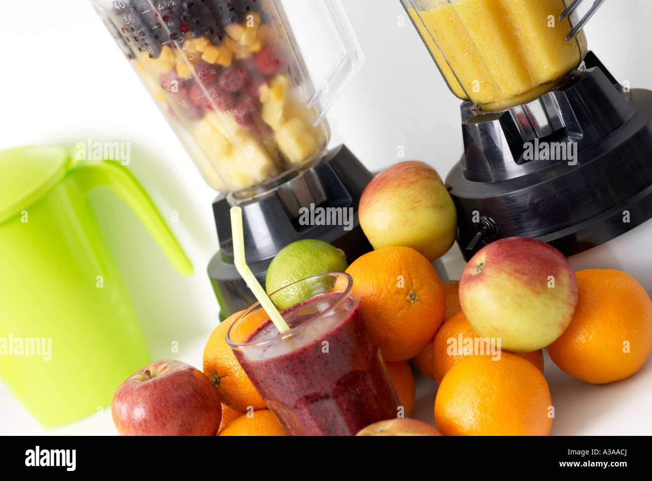 Fresh fruit and blenders for making smoothies and juices, with smoothie