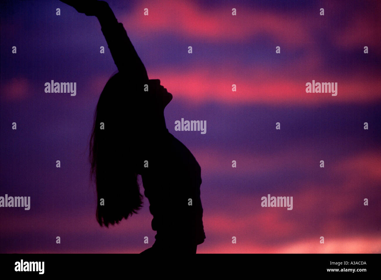 Woman silhouette arms up hi-res stock photography and images - Alamy