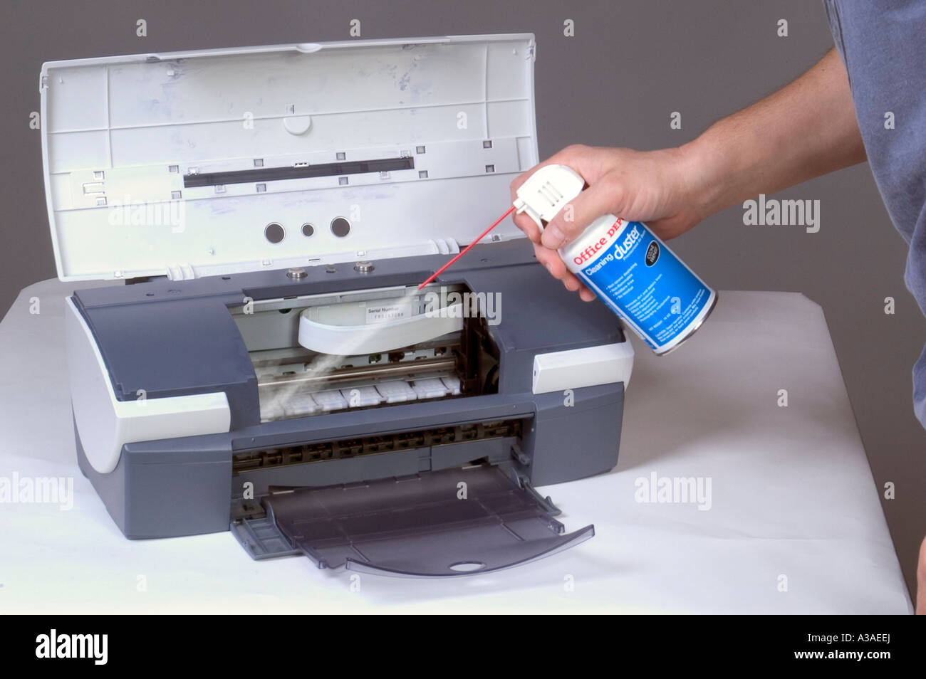 Man Cleaning Computer Printer With Compressed Air 6 Stock Photo Alamy