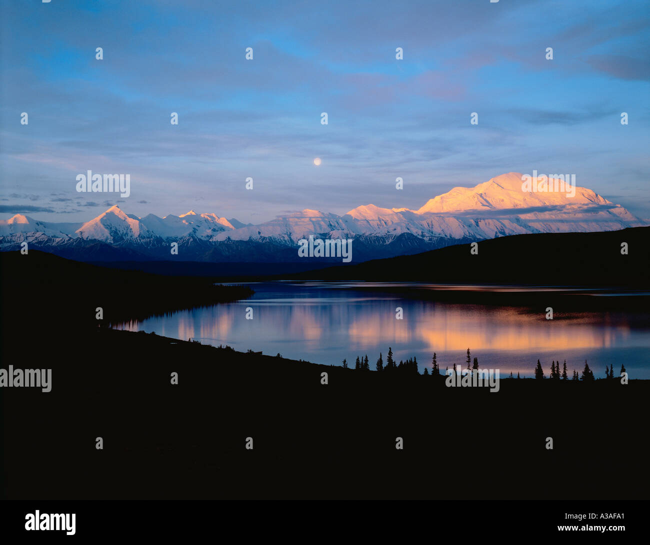 Denali National Park, Alaska, USA, Mt McKinley, Moon and the Alaska Range, reflection in Wonder Lake, Mt Brooks to Mt McKinley Stock Photo