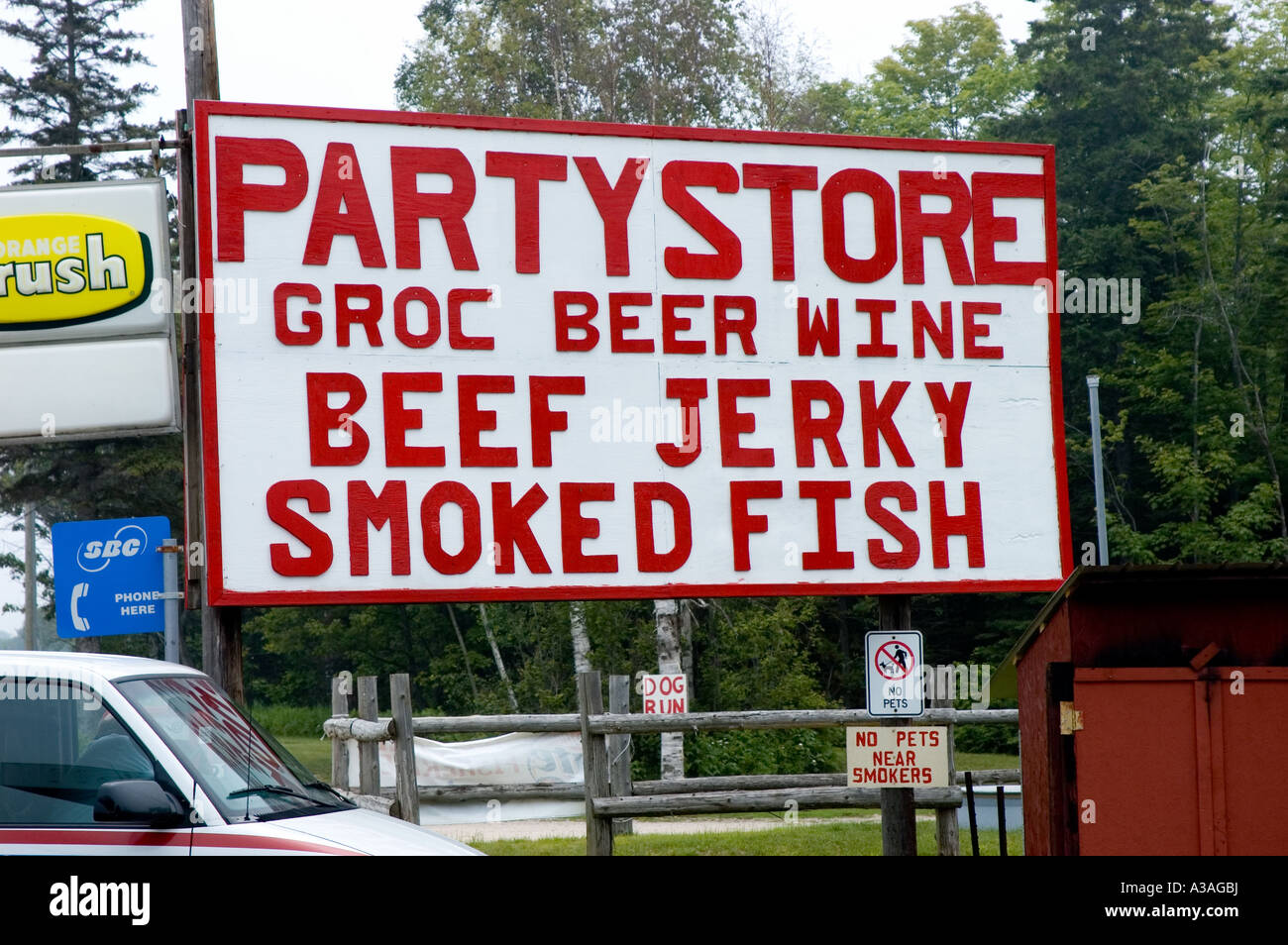 P33 085 Michigan Upper Penninsula Road Side Signage Party Store Smoked Fish Jerky Stock Photo