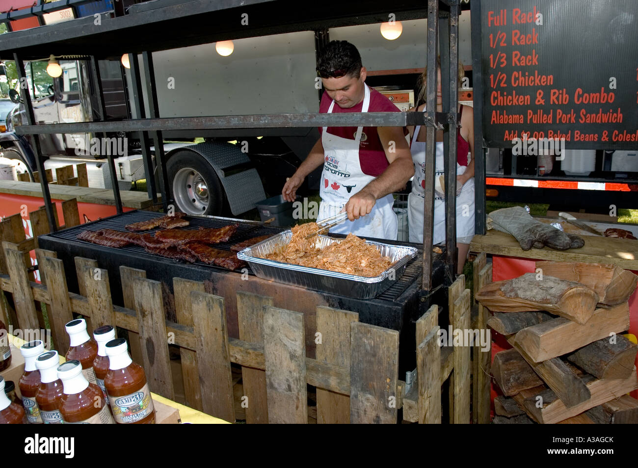 P33 093 Man Handles Chicken At Sarnia Ontario Canada Rib Fest Ribfest ...