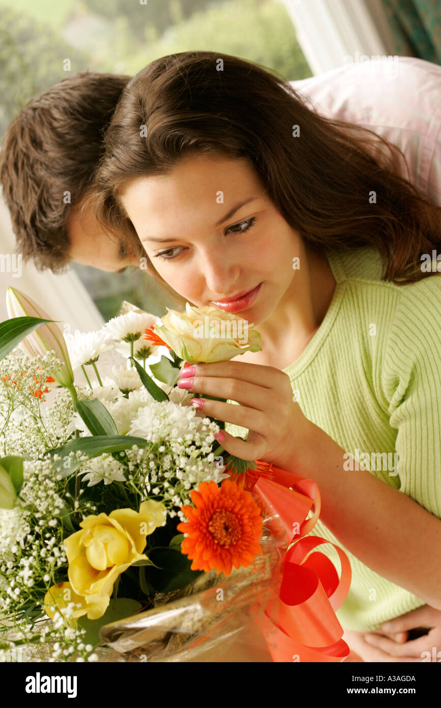 Young couple with flowers Stock Photo