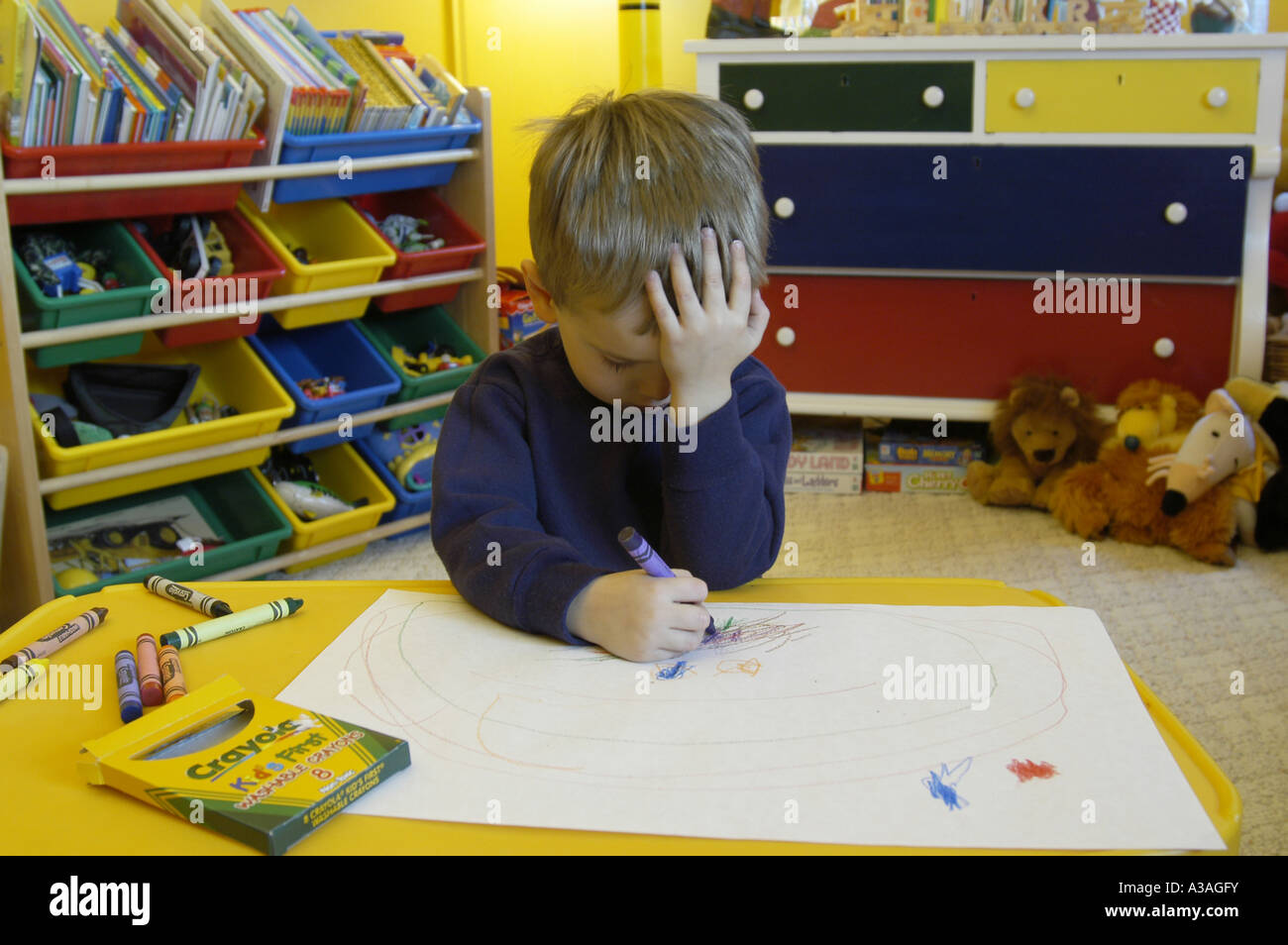 P4 114 3 year old drawing with crayons creative block Stock Photo Alamy