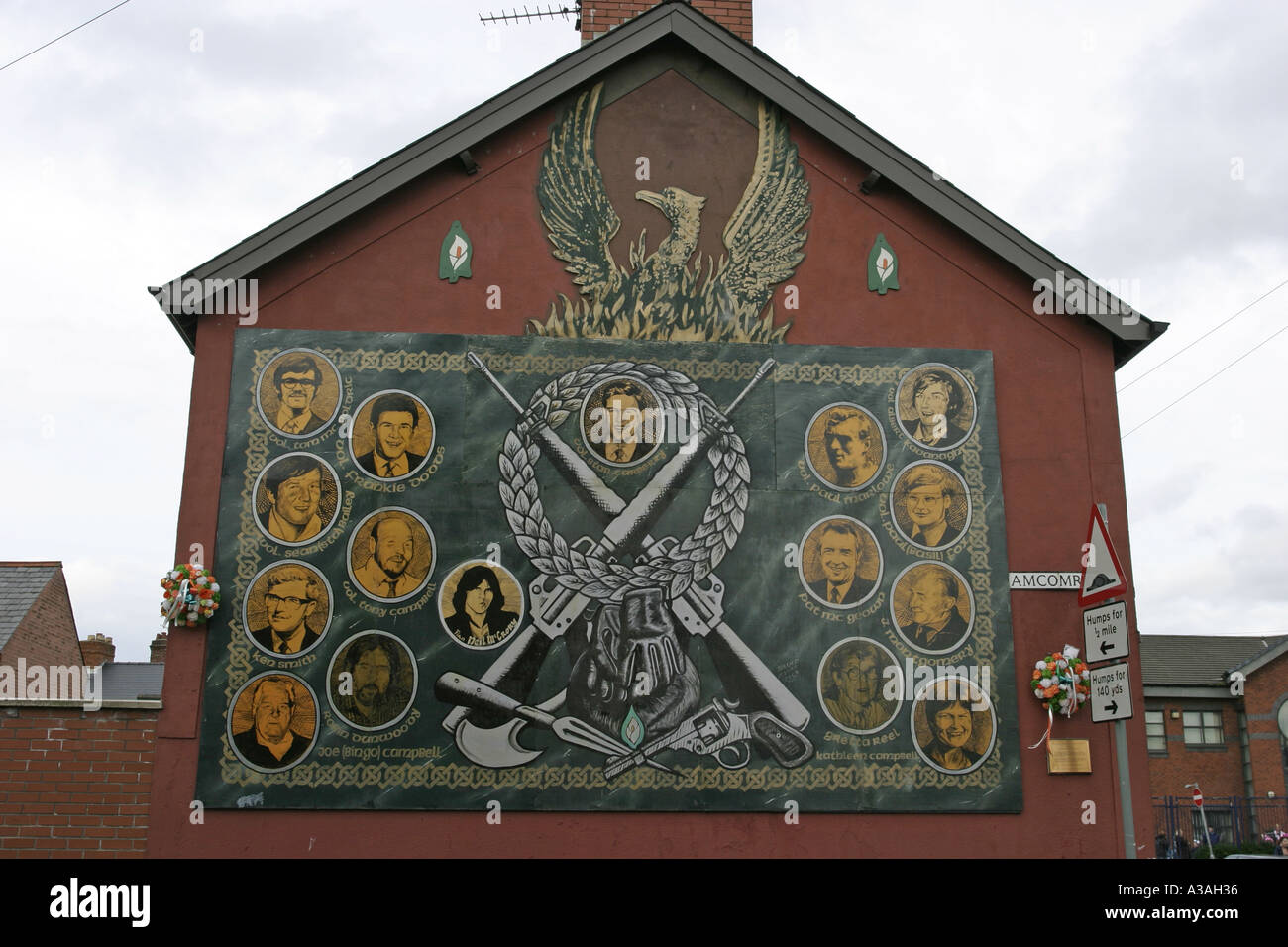 IRA memorial wall mural street off beechmount avenue west belfast northern ireland Stock