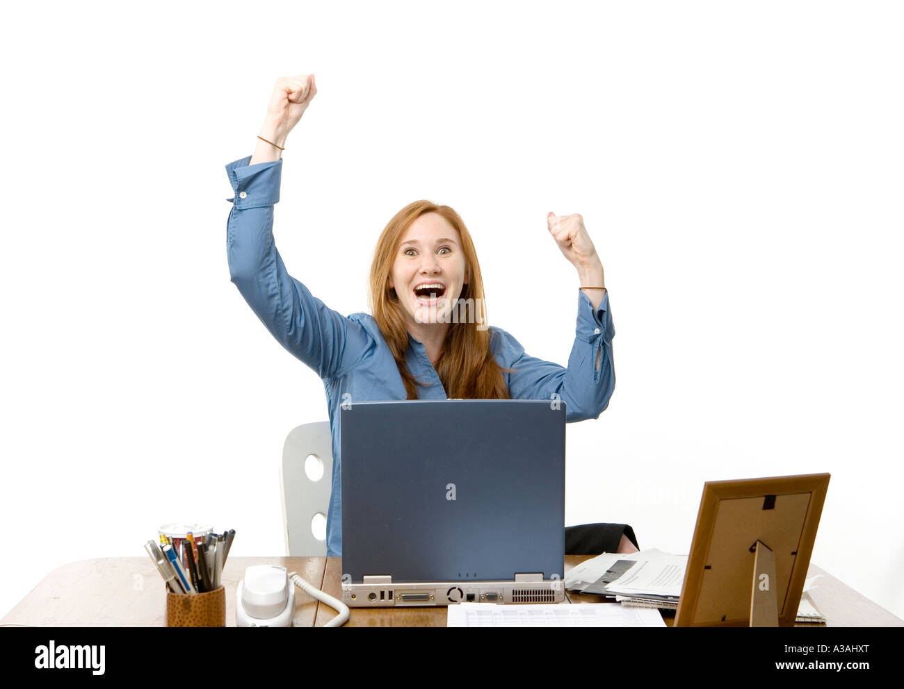 Woman celebrating some success Stock Photo